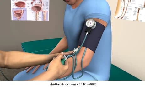 A doctor measuring a patient's blood pressure